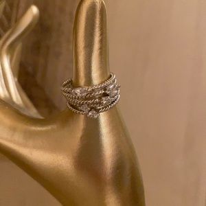 Stacking silver CZ braided rings. 5 rings beautifully stacked together.